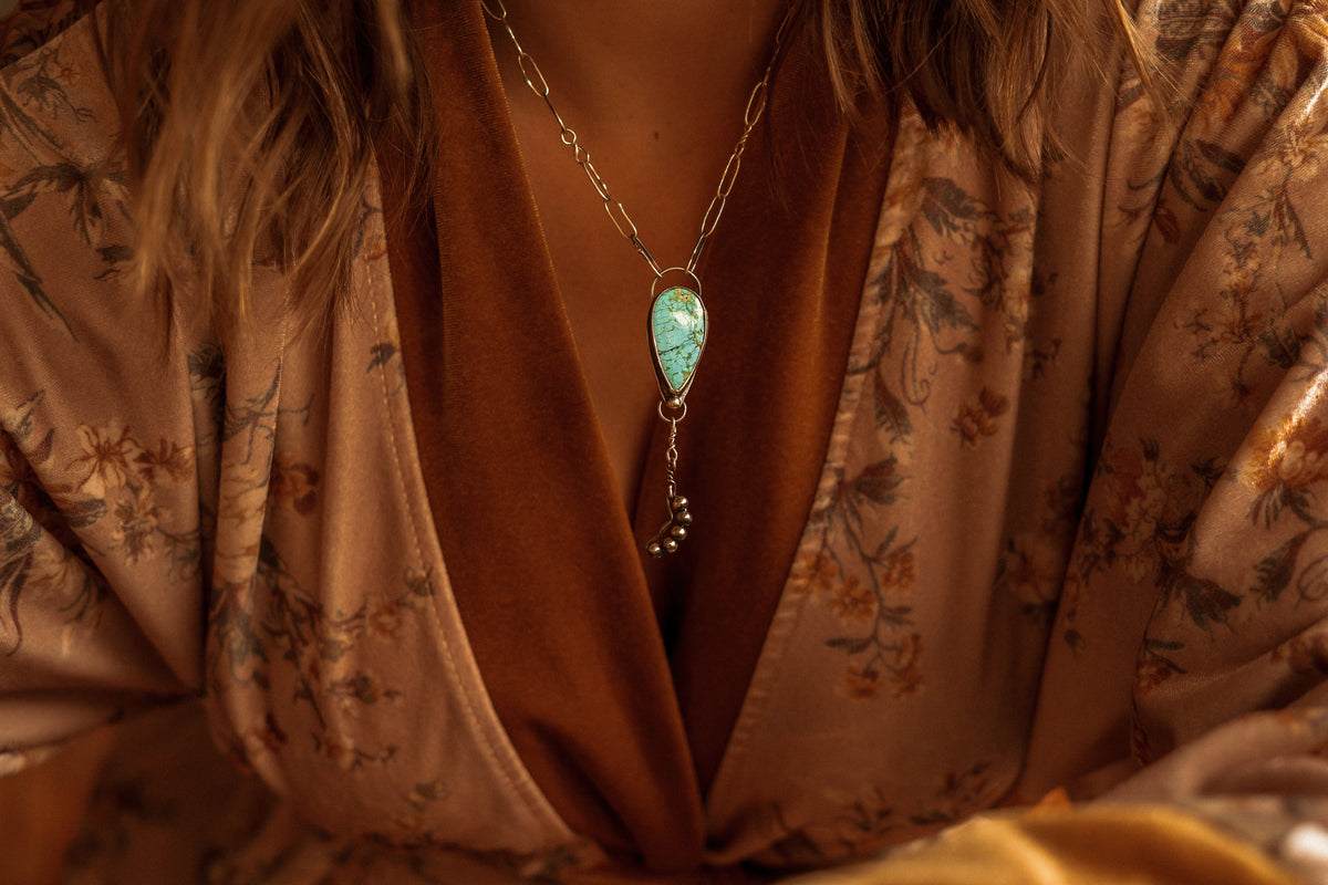 NECKLACES + PENDANTS